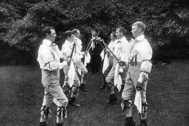 1910:  Morris dancers at the Straford-upon-Avon 'Mop', a hiring fair held on May Day.  (Photo by Hulton Archive/Getty Images)