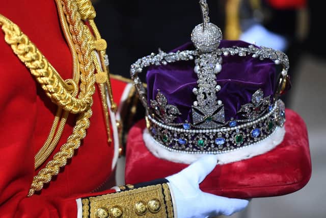 The Imperial State Crown is brought to the Sovereign's Entrance of the House of Lords for the State Opening of Parliament at the Houses of Parliament in London on December 19, 2019.