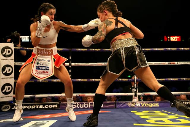 Terri Harper (left) and Eva Wahlstrom fight in the WBC & IBO Super-featherweight World Championship fight at the FlyDSA Arena, Sheffield. (Picture: Richard Sellers/PA Wire)