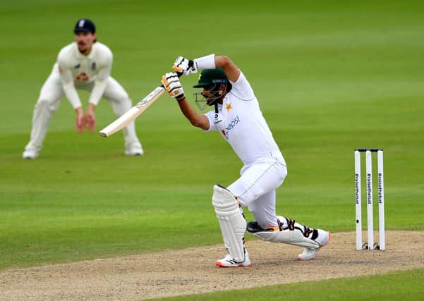 LEADING ROLE: Pakistan's Babar Azam drives on the up through the covers on day one at Old Trafford. Picture: Dan Mullan/NMC Pool/PA.