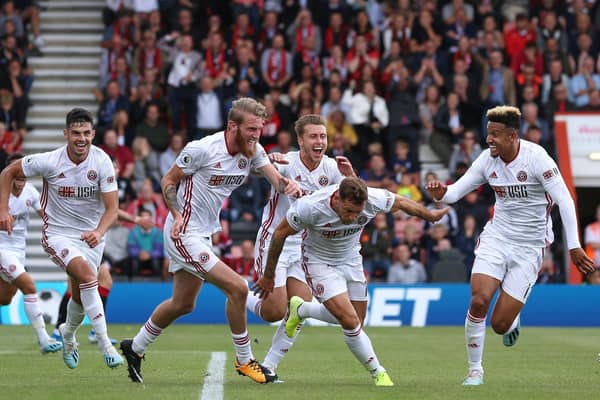 GOOD TIMING: Billy Sharp turns away to celebrate his late equaliser for Sheffield United at Bournemouth on the opening day of the season. Picture: James Wilson/Sportimage