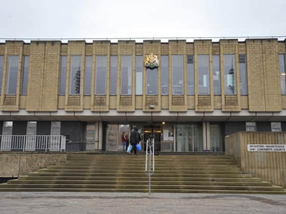A 14-year-old boy was kept in a cell at Bradford Magistrates Court for 11 hours, a report by custody watchdog Lay Observers has claimed