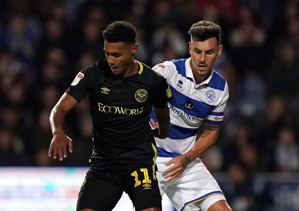 Grant Hall (right) in action for QPR last season (Picture: PA)