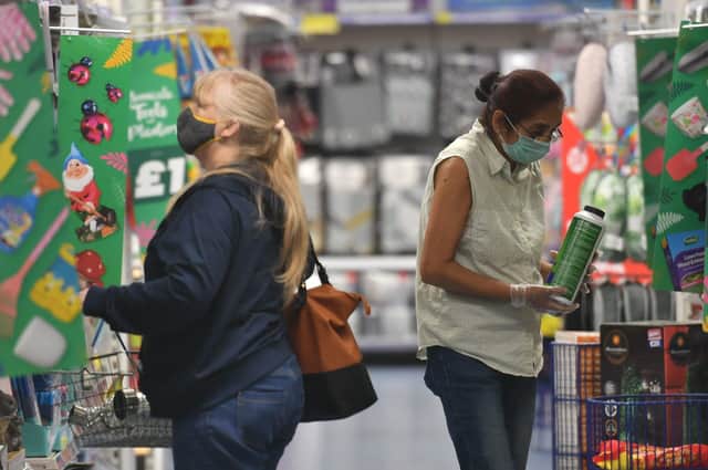 Shopper wearing a face masks in B and M in Leicester - one of the places along with West Yorkshire that has been subject to a local lockdown. PA Photo. Picture: Jacob King/PA Wire