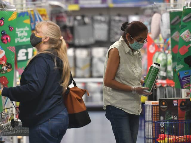 Shopper wearing a face masks in B and M in Leicester - one of the places along with West Yorkshire that has been subject to a local lockdown. PA Photo. Picture: Jacob King/PA Wire