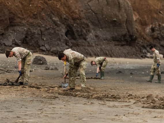 British Army officials working at the beach in Holderness. Picture: MOD.