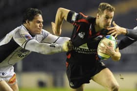 Edinburgh's Chris Paterson (C) makes a break to set up Andrew Kelly to score a try in the last minute during the Heineken Cup Pool 2 rugby match between Edinburgh and Castres Olympique at Murrayfield Stadium in Edinburgh, on January 16, 2009. (Picture: Russell Cheyne/AFP via Getty Images)
