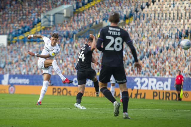 Leeds' Ben White hammers the ball into the net to put Leeds into the lead in their final game of a title-winning season. (Picture: Tony Johnson)