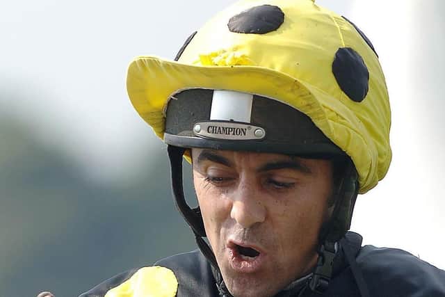 Well done: Jockey Aln Munro's reaction after Sergeant Cecil wins the 2005 Ebor.