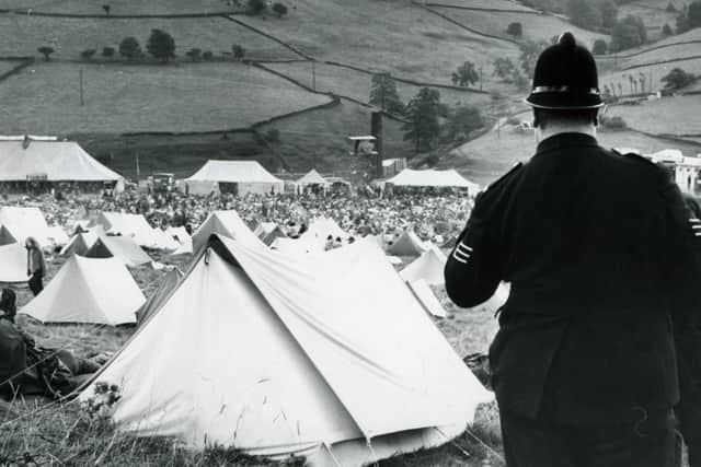 A policeman at the Krumlin Pop Festival shortly before it was washed out, (Picture: JPIMedia).