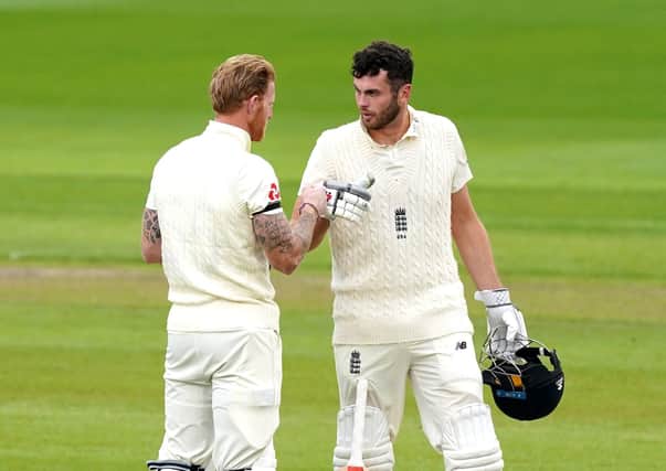England's Ben Stokes (left) and Dom Sibley in conversation.
