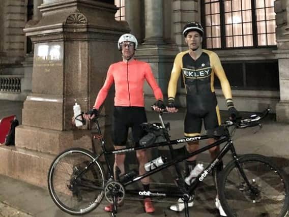 Mark, left, and Doug after finishing their 500-mile ride