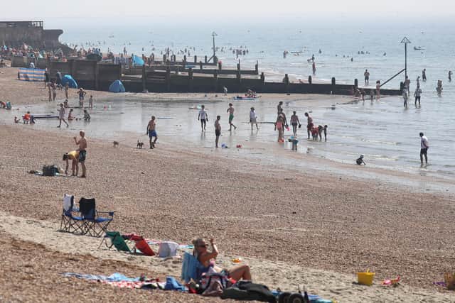 People take to the sea as they enjoy the hot weather