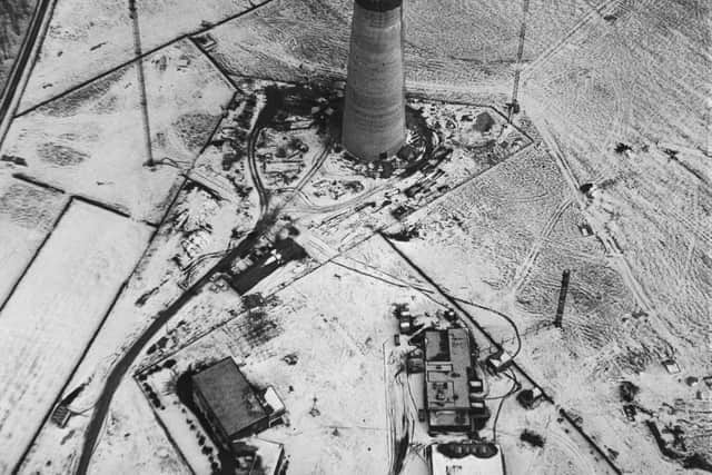 6th March 1970

The new television mast which is being built at Emley Moor seen from the air.

Also in the picture are the temporary masts which are in use at the present time.