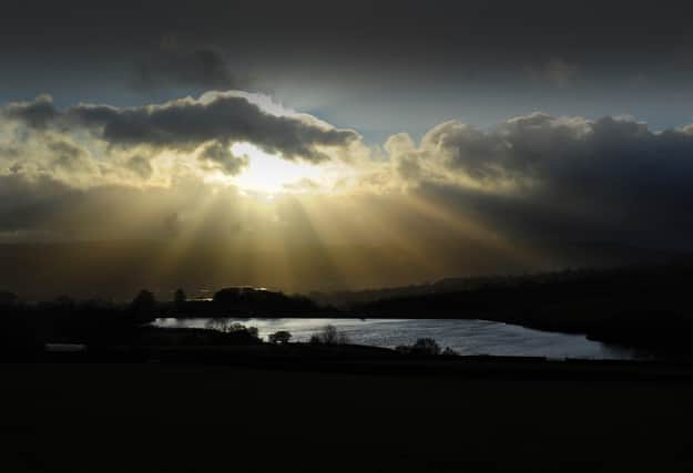 Sunbeams over Silsden Reservoir. Picture by Simon Hulme