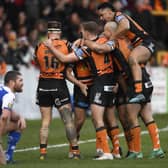 CASTLEFORD, ENGLAND - MARCH 15: Jake Trueman of Castleford celebrates after scoring a try during the Betfred Super League match between Castleford Tigers and St Helens at The Jungle on March 15, 2020 in Castleford, England. (Photo by George Wood/Getty Images)