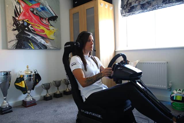 W Series racing driver Abbie Eaton practices on her racing simulator during isolation at her home on May 20, 2020 in Northampton, United Kingdom. (Picture: Mark Thompson/Getty Images)