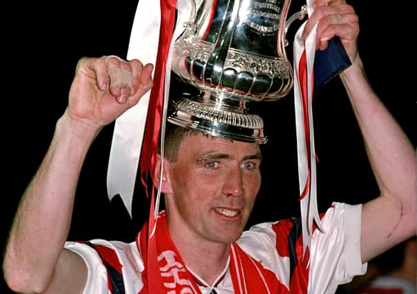 Arsenal's Andy Linighan celebrates his winner after beating Sheffield Wednesday in the 1993 FA Cup final replay. Picture John Stillwell/PA Wire.