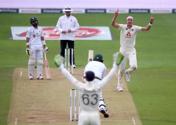 England's Stuart Broad celebrates taking the wicket of Pakistan's Mohammad Abbas.