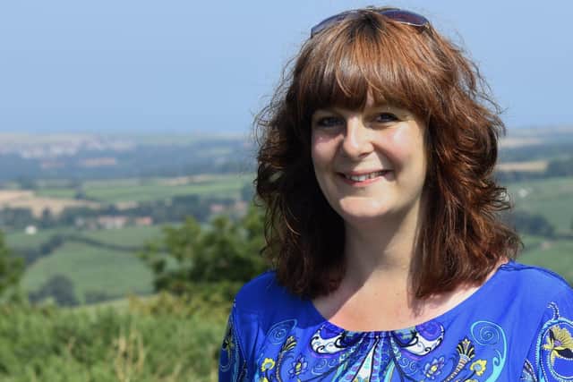 Pictured, teacher Joanne Cassell-Osowski at the top of Blue Bank near Sleights where she now lives with a backdrop of Whitby where she has relocated to from Barnsley, photo credit: Gary Longbottom/ JPIMediaResell