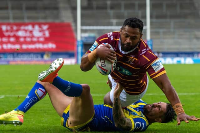 Ukuma Ta'ai dives over for Huddersfield Giants' first try (PIC: Bruce Rollinson/JPIMedia)