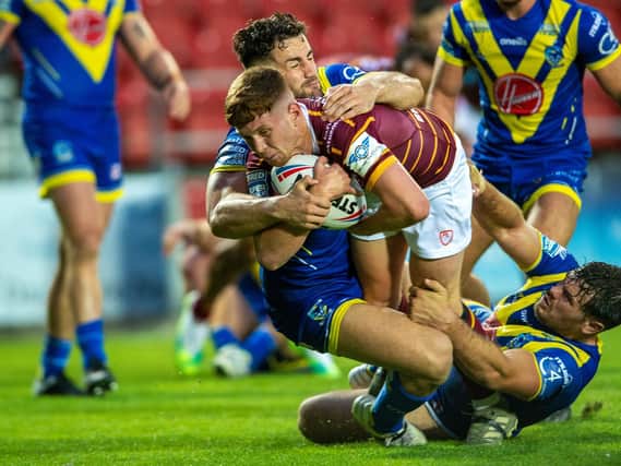 Huddersfield Giants' Olly Russell goes over for his try that levelled the game at 18-18. (PIC:BRUCE ROLLINSON)