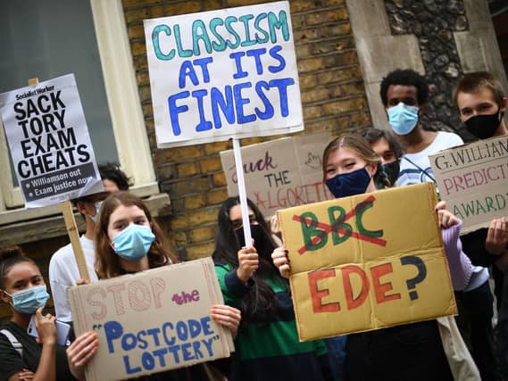 People take part in a protest over the government's handling of A-level results. This week, GCSE students will receive their grades. Photo: Victoria Jones/PA Wire