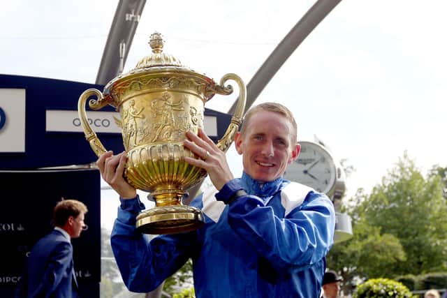 Paul Hanagan in happier times after winning the King George VI and Queen Elizabeth Diamond Stakes on Taghrooda.