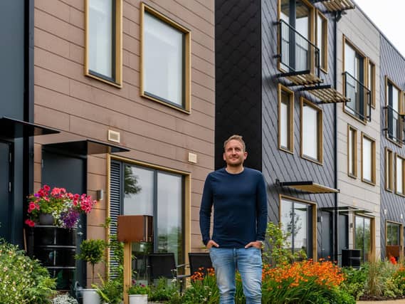 Jonathan Wilson outside his new home in CITU's Climate Innovation District in Leeds