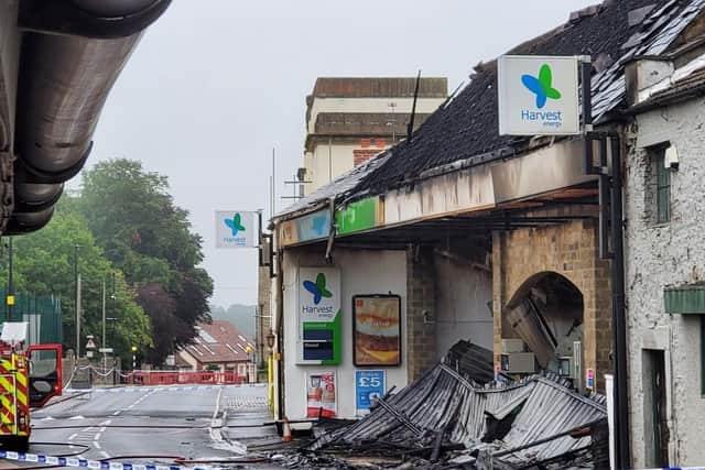 Part of the petrol station's roof has collapsed