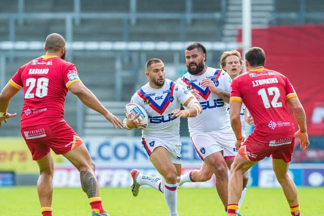 Wakefield's Romain Navarrette takes to the Catalans defence. (PIC: Bruce Rollinson/JPI Media)