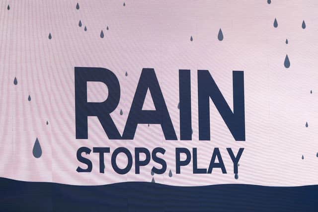 Rain stops play graphic on the big screen (Picture: PA)