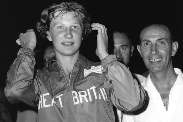 This is Anita Lonsbrough at the medal ceremony after winning a gold medal at the 1960 Olympics.