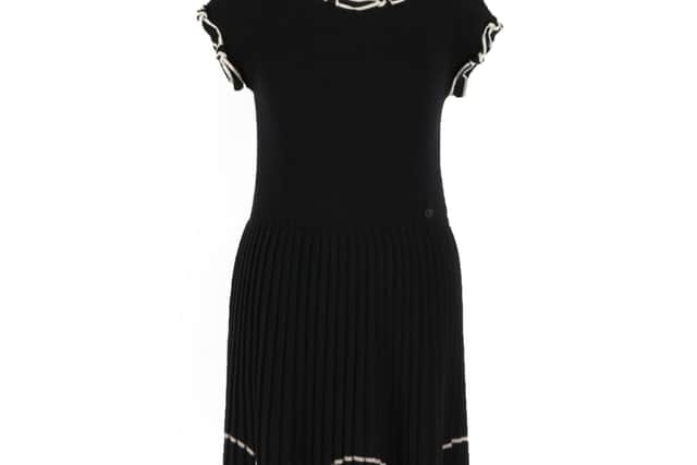 A Chanel ribbed wool dress – One of two Chanel dresses offered with an estimate of £150-250