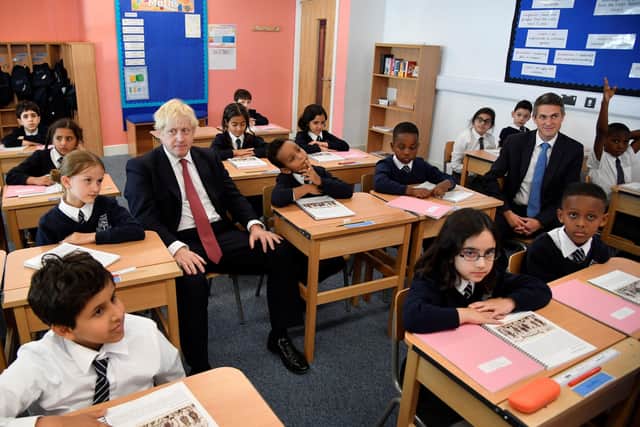 Boris Johnson and Gavin Williamson during a visit to a school before the Covid-19 lockdown.