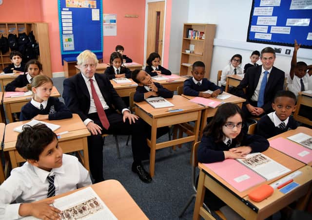 Boris Johnson and Gavin Williamson during a pre-lockdown visit to a school.