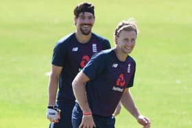 Rory Burns and Joe Root of England share a joke during a fielding drill. (Photo by Stu Forster/Getty Images for ECB)