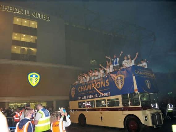 Leeds United players celebrate on the open top bus after their final match against Charlton. Picture: Gerard Binks