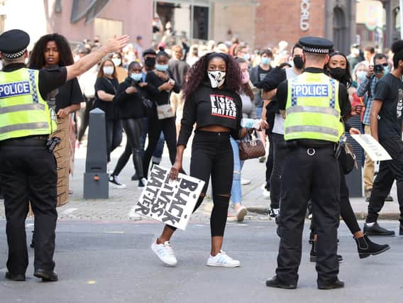 Police and protesters at a Black Lives Matter demonstration in Leeds, as a survey shows 65% of BAME people feel there is bias against them within police forces