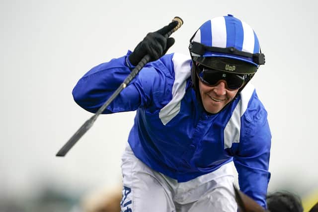 Jim Crowley punches the air after Battaash won a second successive Coolmore Nunthorpe Stakes.