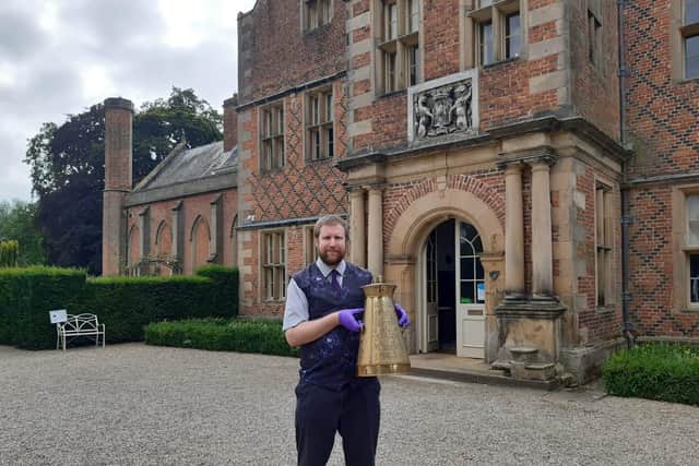 Director of Kiplin Hall and Gardens, James Etherington. Pictured in front of the museum holding an antique milk churn from Miss Marchant’s extensive collection of antique kitchen and dairy equipment which will be displayed in the hall in 2021.