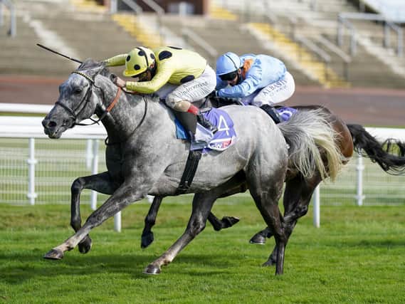 WINNER: Fujaira Prince ridden by Andrea Atzeni (yellow and black silks) wins The Sky Bet Ebor Handicap during day four of the Yorkshire Ebor Festival at York Racecourse. Picture: Alan Crowhurst/PA Wire.