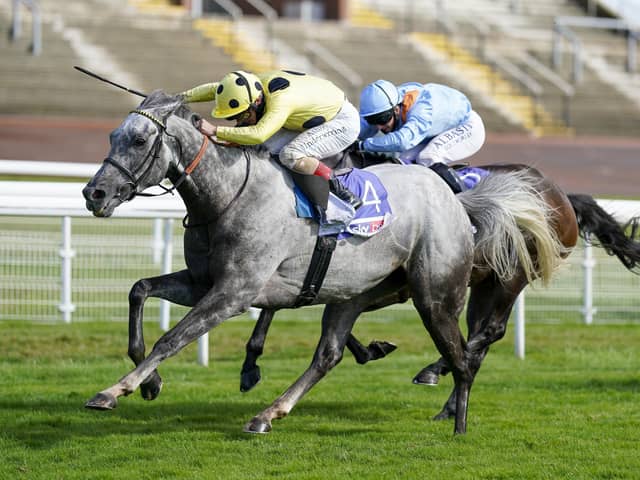 Fujaira Prince ridden by Andrea Atzeni (yellow and black silks) wins The Sky Bet Ebor Handicap. Picture: PA