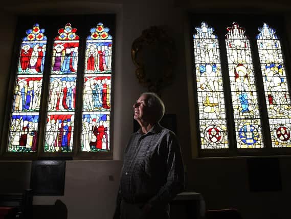 Pictured, David Tichener picture by one of the stain glass windows to be repaired by the National Lottery Heritage fund at All Saints Church, North Street York..23rd August 2020..Photo credit: Simon Hulme/ JPIMediaResell