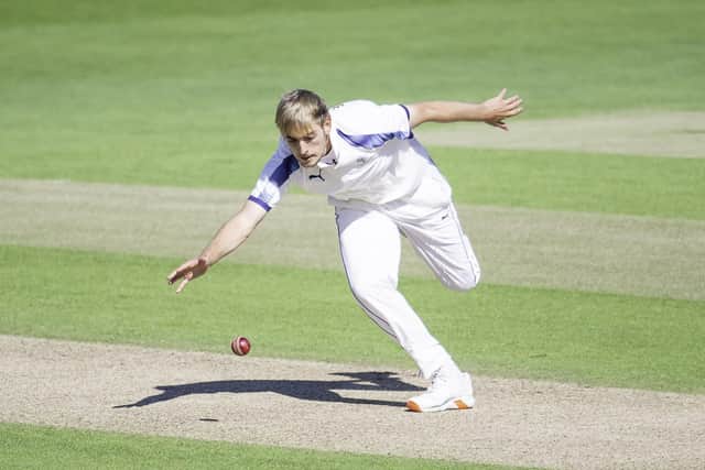 Yorkshire's Jared Warner fields from his own bowling. Picture by Allan McKenzie/SWpix.com
