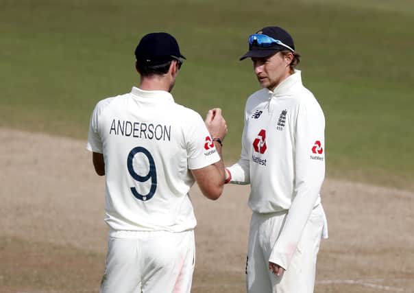 Joe Root: Speaking with James Anderson, is back for Yorkshire. Picture: PA