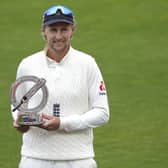 England's Joe Root: With the #RaiseTheBet Test Series 2020 trophy after day five of the third Test. Picture: PA