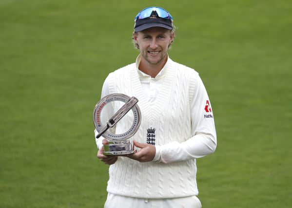 England's Joe Root: With the #RaiseTheBet Test Series 2020 trophy after day five of the third Test. Picture: PA