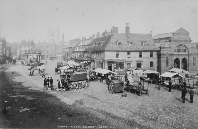 The marketplace in Beverley, Yorkshire, with the Market Cross on the left, 1869. (Photo by Otto Herschan Collection/Hulton Archive/Getty Images)