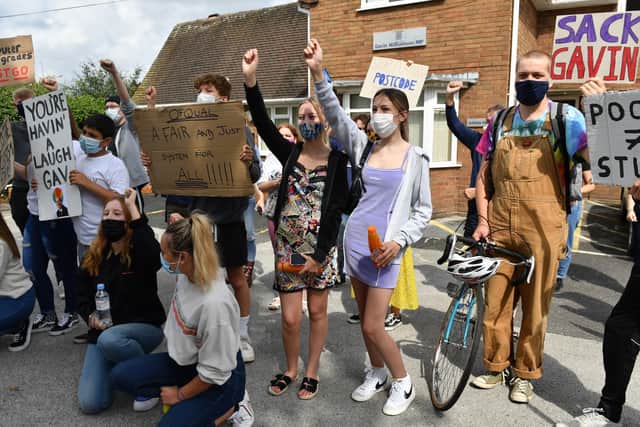Students protest outside Education Secretary Gavin Williamson's constituency office over A-level results.